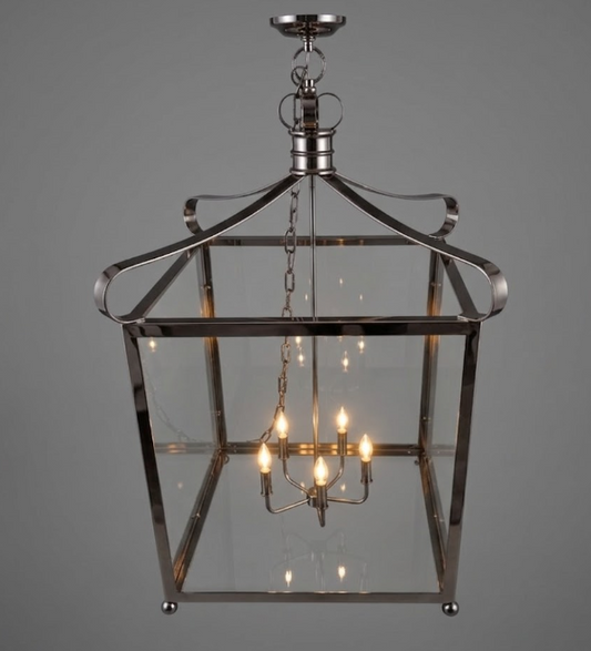 Copper foyer entryway kitchen island pendant light or chandelier with glass panels on a gray background