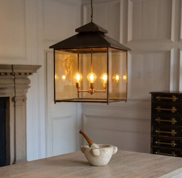 Decorative hanging Kitchen Island Pendant Light Fixture light fixture in a kitchen with a fireplace and wooden table.