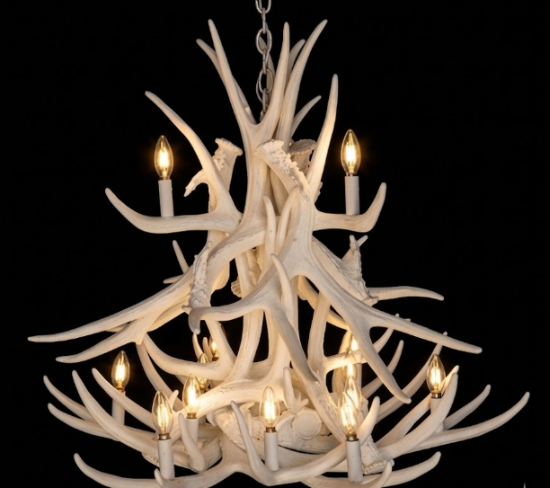 White faux deer antler chandelier with multiple lights on a black background
