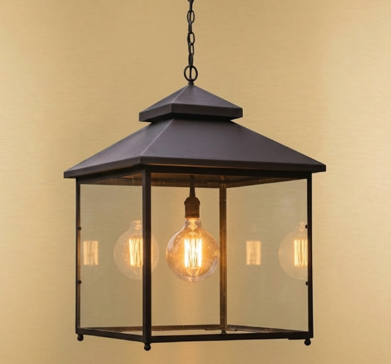 Hanging Kitchen Island Pendant lantern with glass cover and visible light bulbs against a beige background