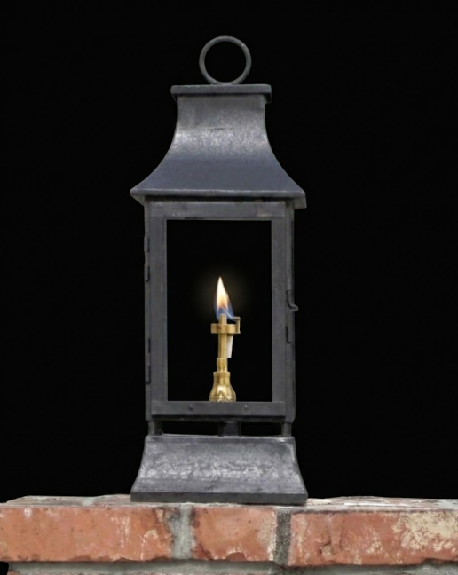 Black gas lantern with a lit candle inside on a brick surface against a black background