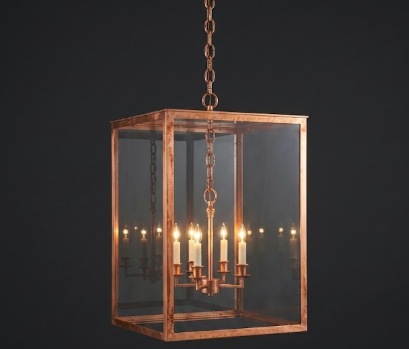 Decorative pendant light chandelier with glass panels on a dark background