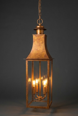 Bronze hanging pendant light fixture on a dark background