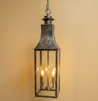 Decorative hanging kitchen island pendant lantern with three lights on a beige background