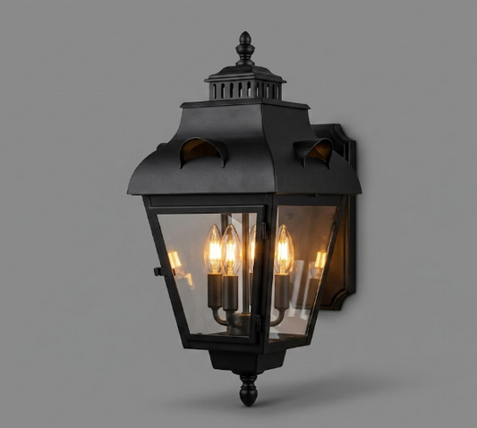 Decorative outdoor wall light fixture on a gray background