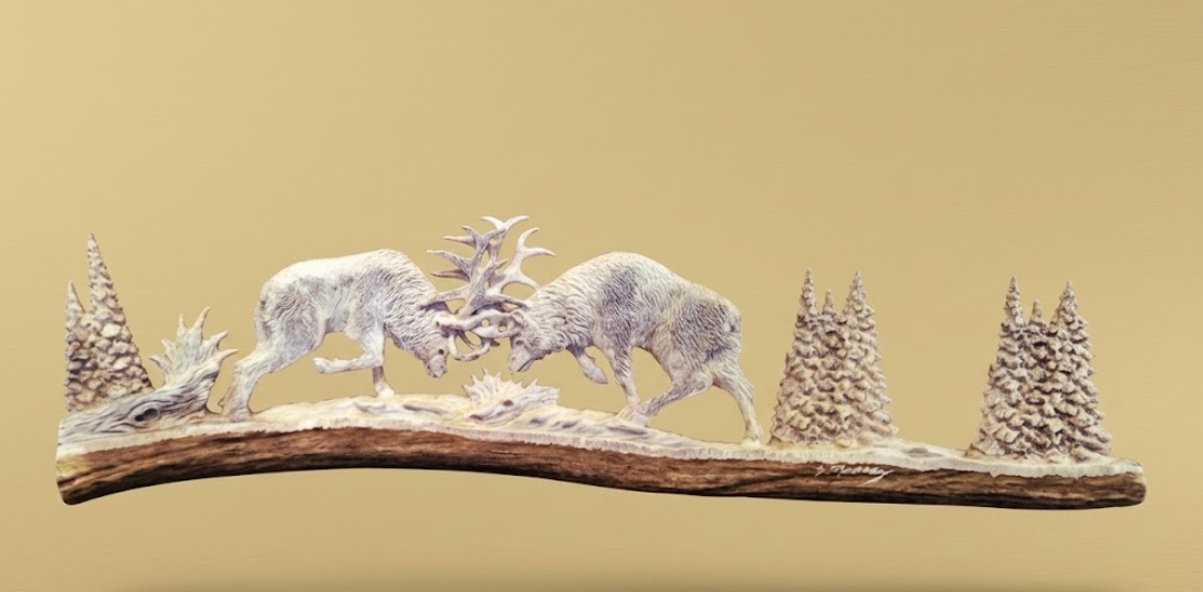 Decorative scene with two deer on a wooden base against a beige background