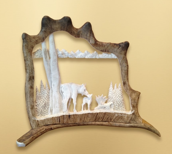 Caribou wall art featuring  a moose and her calf in a forest design on a beige background