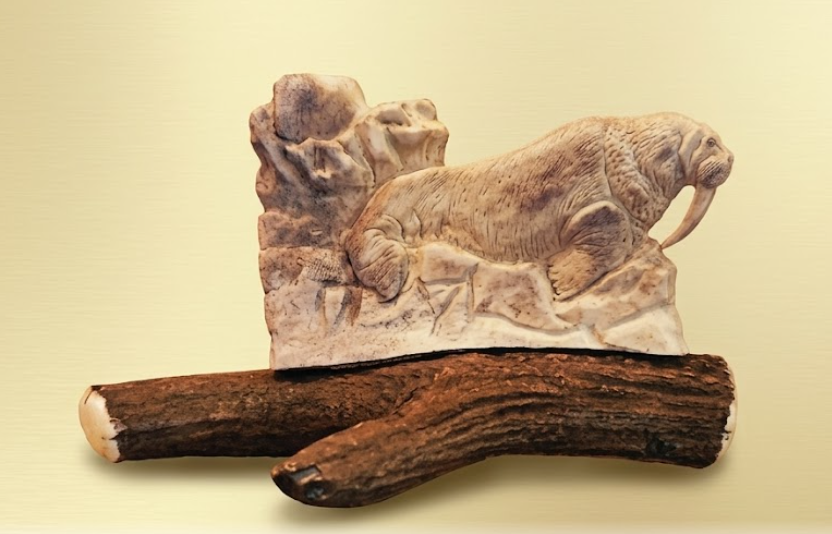 Hand carved walrus antler carving