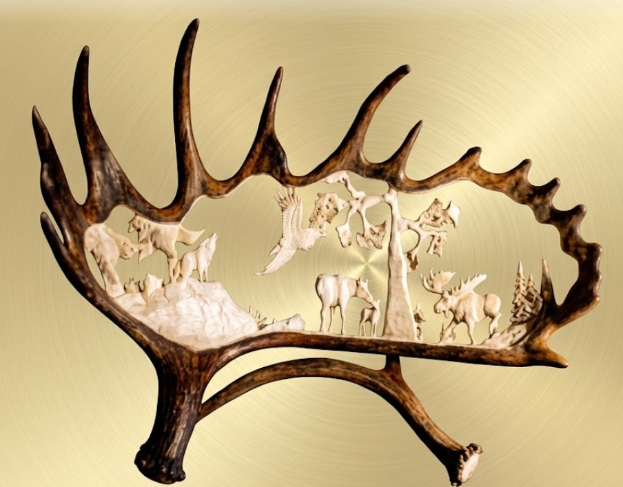 Decorative wall art with antlers featuring embossed animal figures on a beige background