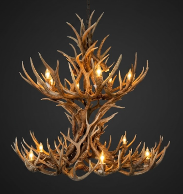 deer Antler chandelier with lights on a dark background