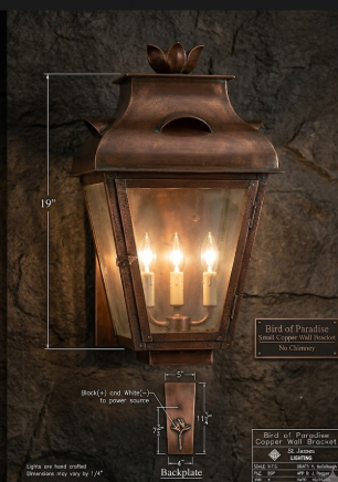 Custom Design -Vintage-style copper outdoor entryway wall light fixture with measurements on a stone wall background