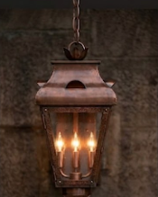 Custom Design -Vintage-style hanging foyer entryway kitchen kitchen island pendant light with warm glow against a dark wall