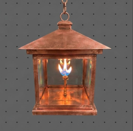 Raw copper foyer entryway kitchen island pendant light with a flame inside on a gray background