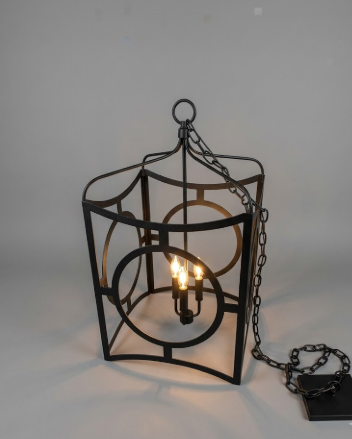 Decorative black metal hanging  copper foyer entryway kitchen island pendant light or chandelier with glass shades with a 3 light bulbs inside on a gray background