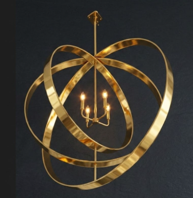 Gold chandelier with circular design on a dark background