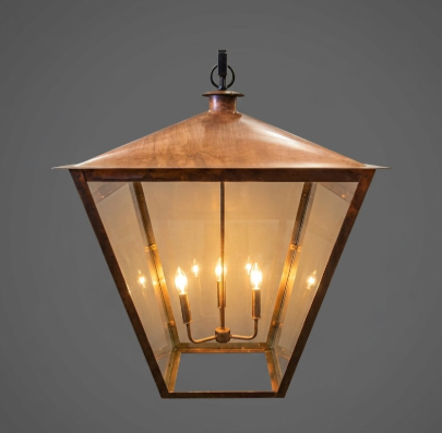 Copper entryway light with a dark grey background