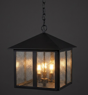 Black copper pendant light with a dark background