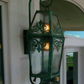 Rustic cabin outdoor electric lantern lights